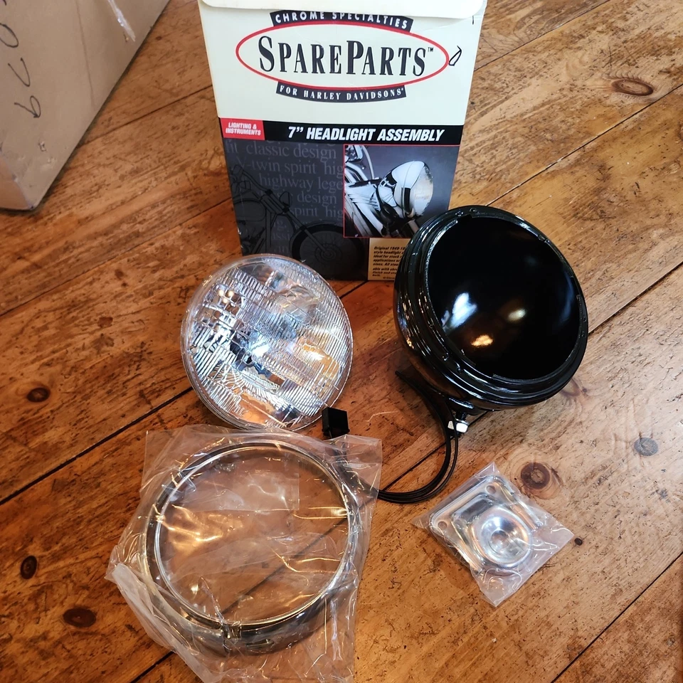  7" HEADLIGHT ASSEMBLE, BLACK W49-84 FLH replaces OEM 67701-49 - Image 1 of 4