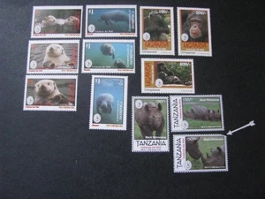 Uganda Briefmarken & Tansania & Dominica unbenutztes Lot... kostenloser internationaler Versand! - Bild 1 von 12