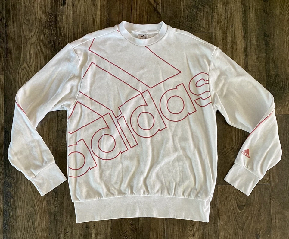 Sudadera pulóver Adidas Essentials para mujer de gran tamaño con logotipo blanca y rosa mediana Foto 1 de 3