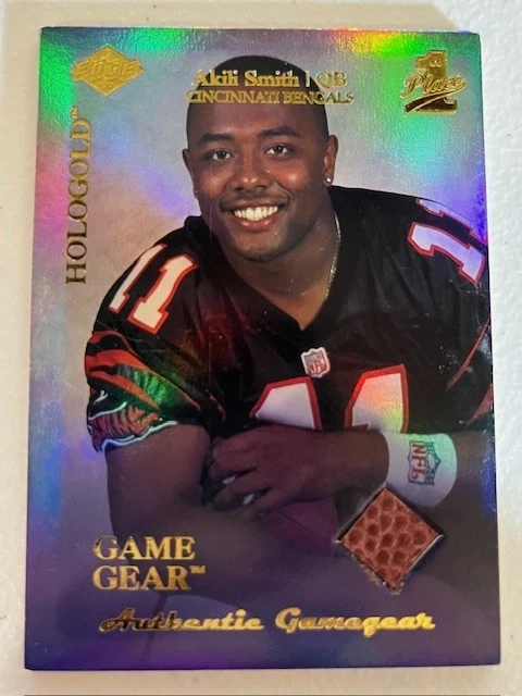 1999 Collectors Edge AKILI SMITH #RG3 Game Gear HOLOGOLD - GAME BALL 1st PLACE - Image 1 of 2