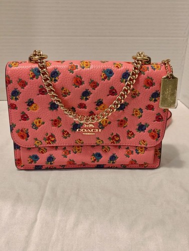 Tracolla Coach Klare nuova senza etichette con mini stampa rosa vintage CA540. $398