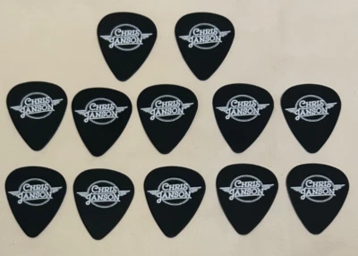 Tortex CHRIS JANSON NEGRO Selecciones de Guitarra Fender LOTE DE 12 *Envío Gratis* Foto 1 de 3