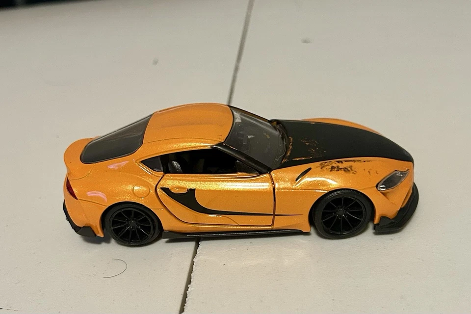 Toyota GR Supra diecast No 32264 orange /black 1/32 scale fast and furious f9  - Image 1 of 4