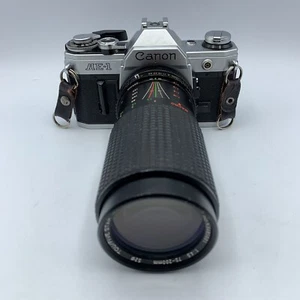 Cámara fotográfica Canon AE-1 35 mm SLR Tou/Five Star MC macro automática 75-200 mm - probada - Imagen 1 de 12