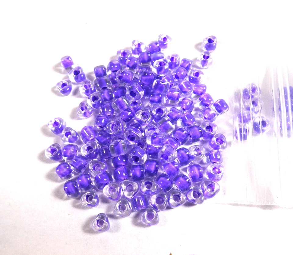 125 Miyuki Transparent Color-Lined Clear & Purple Glass TRIANGLE BEADS - Image 1 of 1