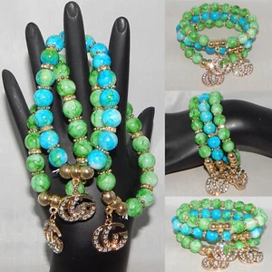 JUEGO DE 3 PULSERAS ELÁSTICAS DE MODA VERDE LIMA Y MÁS CUENTAS VERDES - Imagen 1 de 1