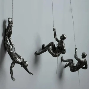 Set 6 sculture da parete arte uomo arrampicata in resina stile industriale decorazione da appendere - Foto 1 di 8