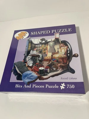 Bits and Pieces Shaped Jigsaw Puzzle; A Stitch in Time, Russell Cobane; 750 pcs - Image 1 of 2