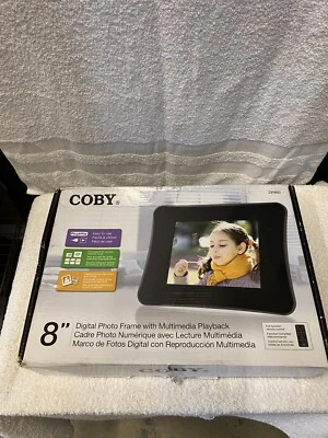 Coby 7" Digital Photo Frame NEW In Box W Stand & Power Cord Box Has Damage - Image 1 of 4