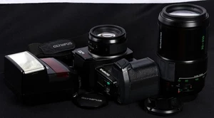 Olympus OM707 AF SLR c/w Battery Grip, AF 50/1.8, 70-210mm Lens & F280 Flash Kit - Picture 1 of 14