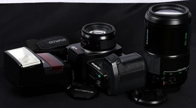 Olympus OM707 AF SLR c/w Battery Grip, AF 50/1.8, 70-210mm Lens & F280 Flash Kit - Image 1 of 4