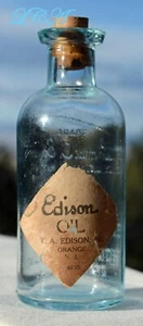 Botella de ACEITE EDISON antigua rara ETIQUETADA - 1er estilo usada - Turquesa REPUJADA - Imagen 1 de 5