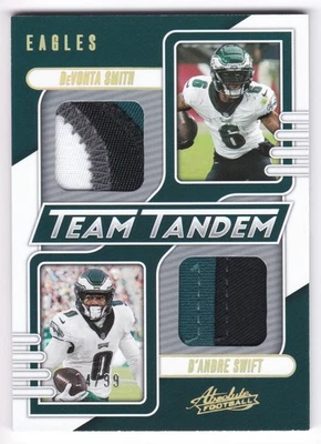 2023 Absolute DeVonta Smith D'Andre Swift Team Tandem Materials Gold Patch #/99 - Image 1 of 2