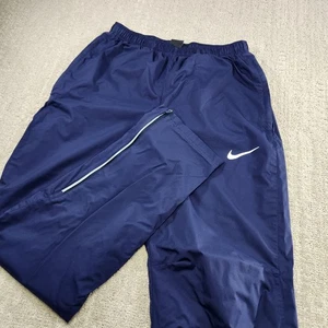 Pantalones para correr Nike tejidos para hombre pequeños azules reflectantes de malla forrados con cremallera al tobillo - Imagen 1 de 10