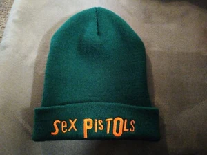 SEX PISTOLS - SOMBRERO GORRO VERDE CON LETRAS NARANJAS - SOMBRERO INVIERNO/OTOÑO - ACRÍLICO - Imagen 1 de 13
