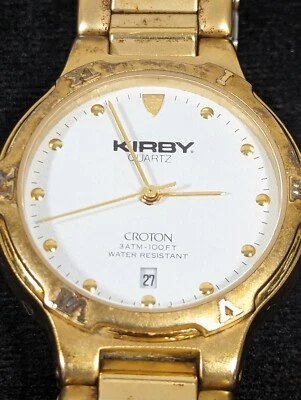 Reloj Reliance By Croton esfera blanca redondo tono dorado caja acero inoxidable correa St Foto 1 de 4