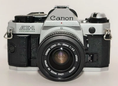 Canon AE-1 Program 35mm Film Camera Silver + FL 35mm f/3.5 Lens - Tested Working - Image 1 of 4