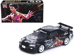 Nissan Skyline GT-R (R34) RHD (Right Hand Drive) Black 1/64 Diecast Model Car - Picture 1 of 3