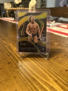 2024 Panini WWE Select Rowdy Roddy Piper Ringside Gold 9/10 - Picture 1 of 2