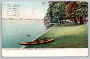 Burlington NJ Delaware River, Kayak on Green Grass Bank, Undivided Back Postcard - Picture 1 of 3
