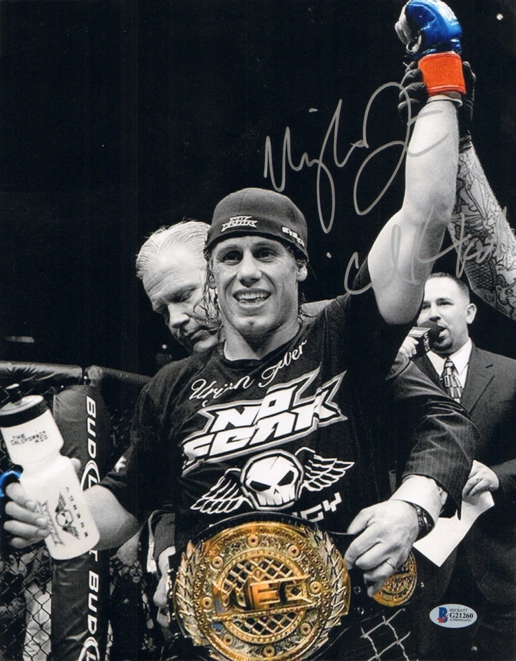 ФОТОГРАФИЯ С АВТОГРАФОМ УРАЙИ ФАБЕРА 11X14 BAS BECKETT СЕРТИФИКАТ ПОДЛИННОСТИ UFC WEC 19 ЧЕМПИОН KOTC - Изображение 1 из 1