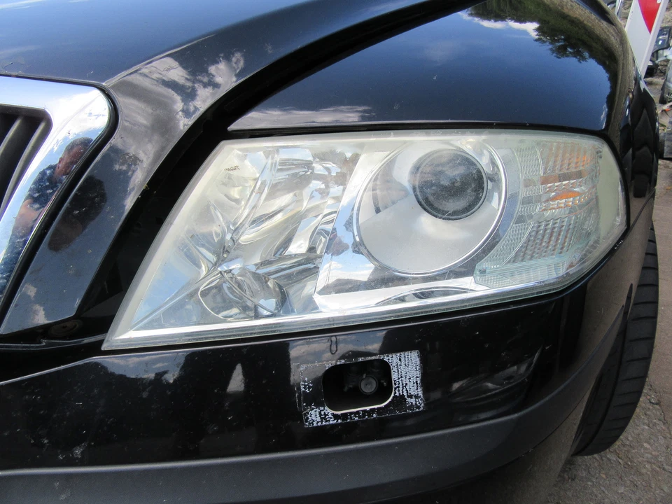 Orig. Scheinwerfer Xenon links Skoda Octavia 2.0 FSI 1Z - Bild 1 von 1