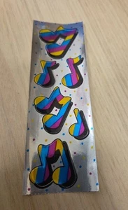 Vintage 1980s Russ Dandies Rainbow MUSIC NOTES Foil 6"x2" Sticker Strip - Picture 1 of 3