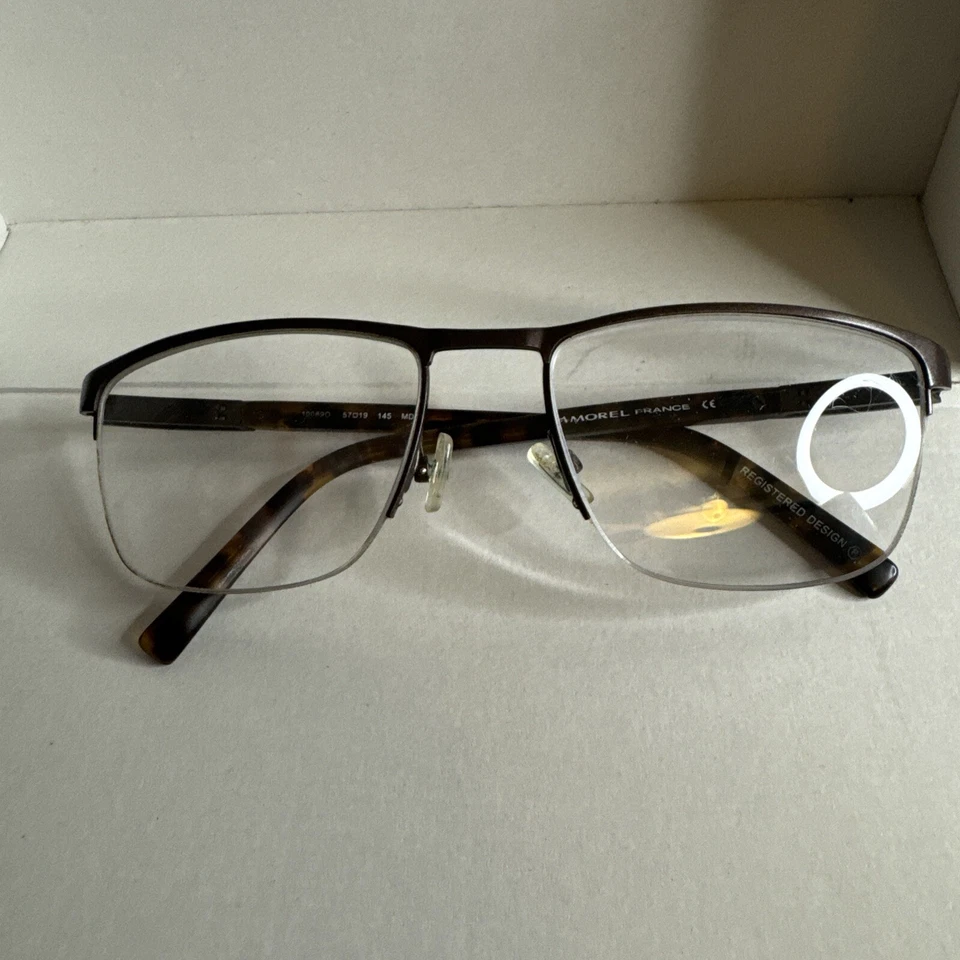 Armação de óculos óptica OGA Morel 10089O marrom MD12 semi aro metal 57-19-145 - Imagem 1 de 4
