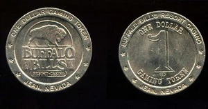 TWO OLD $1 METAL GAMING TOKENS - BUFFALO BILL'S & McCARRAN AIRPORT (S130/410) - Picture 1 of 2