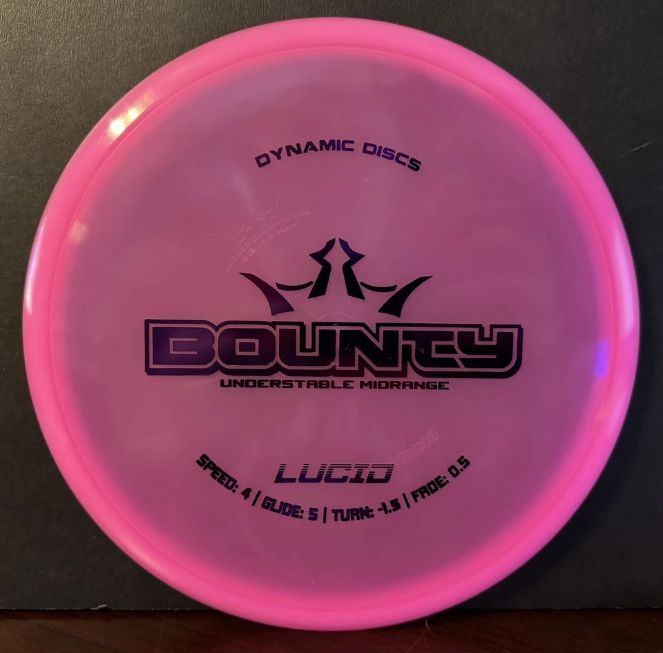 Dynamic Discs Lucid Bounty Disc Golf Midrange 171g Pink With Purple Stamp - Image 1 of 1