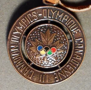 Olimpiadi canadesi – Olimpiadi canadesi III, (Foglia d'acero e anelli smaltati) T - Foto 1 di 1
