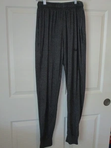 Pantalones deportivos Nike unisex gris oscuro talla mediana cintura elástica e inferior propios - Imagen 1 de 4