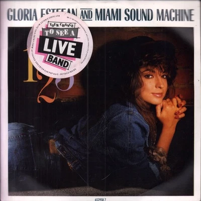 Gloria Estefan 123 7" vinyl UK Epic 1988 pic sleeve has competition sticker on - Image 1 of 3