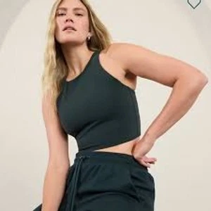 Sujetador deportivo Athleta Consciente Crop negro sólido cuello alto sin mangas talla XS (A-C) - Imagen 1 de 4
