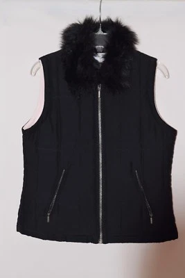 Chaleco tipo abrigo negro acolchado para el invierno Foto 1 de 4