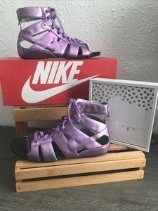 purple nike slippers