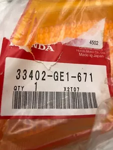 New OEM Honda CH80 Elite 80 XH150 R Front Turn Signal Lens 33402-GE1-671 - Bild 1 von 2