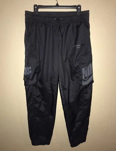 Nike Swoosh Windbreaker Sportswear Trainingshose Damen Medium schwarz neu ohne Etikett - Bild 1 von 8