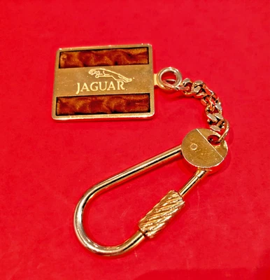 Vintage Jaguar Keychain & Fob - Engraved Dark Brown Wood Tone and Gold metal  - Image 1 of 3