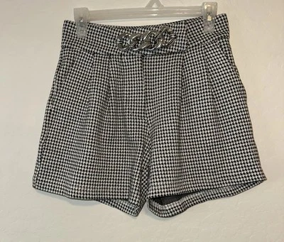 Pantalones cortos plisados de tiro alto con cremallera lateral de lana Alexander Wang para mujer pata de gallo 2 Foto 1 de 4