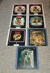 7 CED VIDEO DISCS RAIDERS LOST ARK FLASHDANCE & MORE SEE DESCRIPTION - Picture 1 of 11