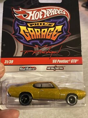 Pontiac GTO GOLD metal Real Riders 2009-10 1969 Hot Wheels Garage Real Riders Foto 1 de 4