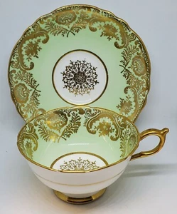 Paragon HM The Queen & HM Queen Mary Bone China Goldfarbe Teetasse Untertasse - Bild 1 von 6
