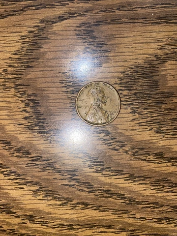 1934-p error wheat cent, 1,9,3 on date, AMER & STA on states, reverse Cover