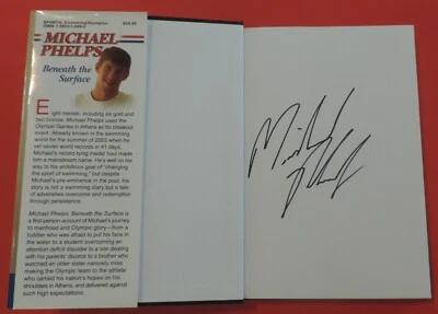 LIBRO BAJO LA SUPERFICIE FIRMADO/AUTOGRAFIADO POR MICHAEL PHELPS Foto 1 de 3