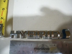 TOYOTA  HYBRID BLUE LETTERS CHROME  SYMBOL EMBLEM  OEM BAGDE - Picture 1 of 1