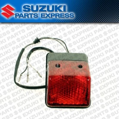 NEW SUZUKI OEM REAR BREAK LIGHT ASSEMBLY DRZ250 2001 - 2007 35710-13E11 - Image 1 of 4
