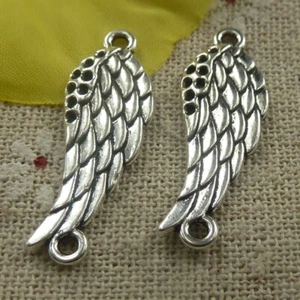 Envío gratuito 102 piezas conectores de ala plata tibetana 31x11x2mm L-4489 - Imagen 1 de 4