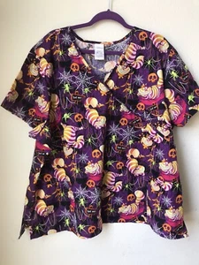 WOMEN'S DISNEY HALLOWEEN CHESHIRE CAT V NECK MOCK WRAP SCRUB TOP SIZE 3 XL NWT - Picture 1 of 8
