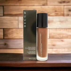 BECCA Aqua Luminous Perfecting Liquid Foundation Deep Bronze 1oz - NIB AUTHENTIC - Picture 1 of 3